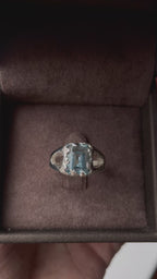 Video with sky topaz ring