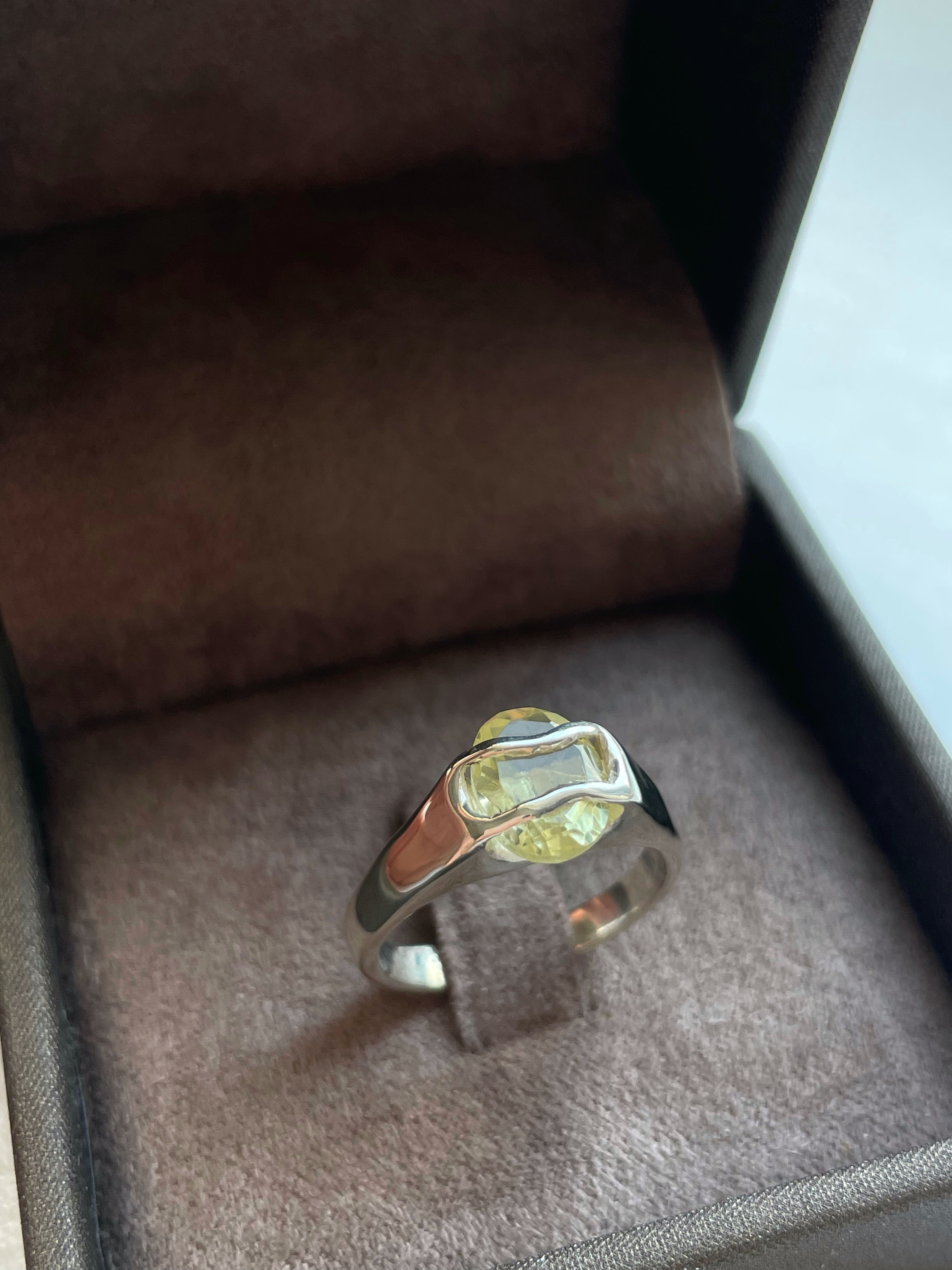 Silver bespoke ring made by Vira Shyltsova with  lemon quartz.