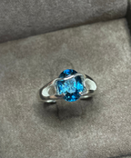 Bespoke silver ring with london topaz.
